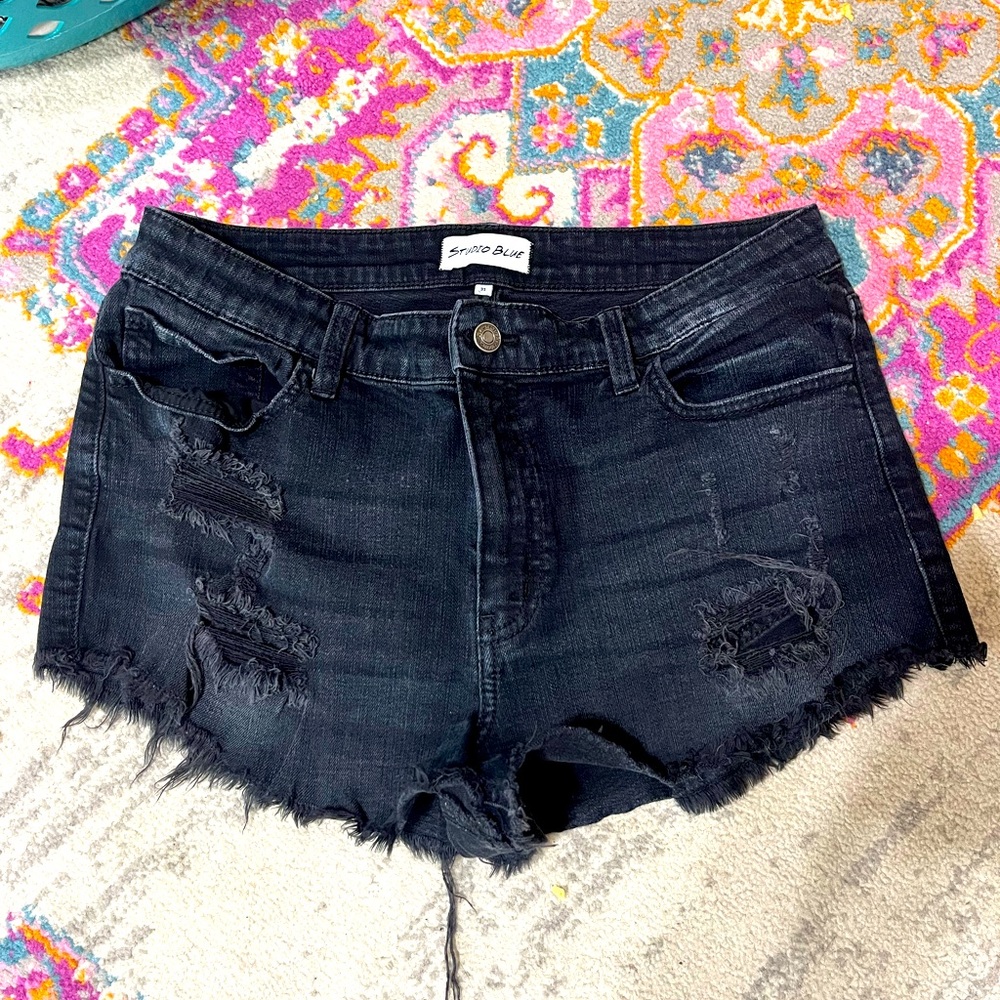 Distressed black denim shorts